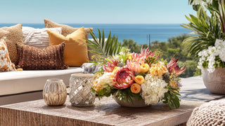 Beautiful Outdoor Patio Area with Contemporary Decor Style Furniture and a Beautiful Large Floral Arrangement - The Summer Edit
