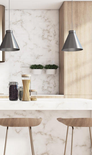 a contemporary decor style kitchen with counter stools and contemporary lighting