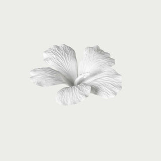 Matte white porcelain hibiscus flower accent with sculpted petal detail, displayed on a neutral background, Third & Main, Contemporary decor.