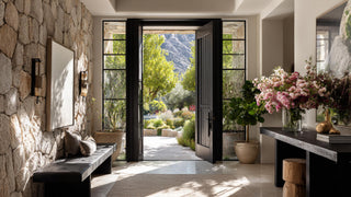 Stunning entry with realistic faux florals in a seasonal pink.