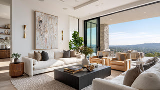 Elegant siting room with wide open doors to a view.