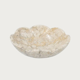 10" swirled cream and brown marble decorative bowl with scalloped edge.