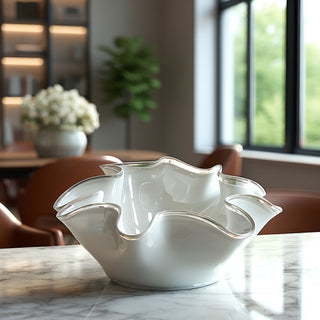 styled in a luxurious dining area 12" Contemporary decor style Frosted white glass bowl with sculptural ruffled edges 