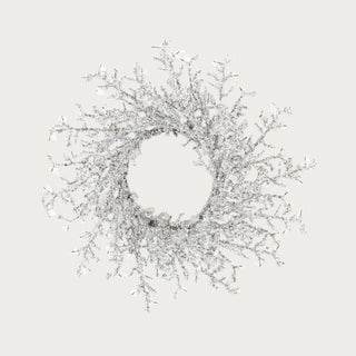 A 16 inch in diameter silver iced crystal candle ring/wreath of winter and holiday decor. style it with pillar candles, on a door, a mantel or on a dining room table with florals or candles. Perfect home decor piece by Third & Main