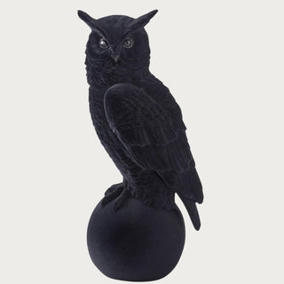 Black velvet-flocked owl sculpture measuring 18.25 inches high with detailed wings and feathers, pointed ears, and a round pedestal base.