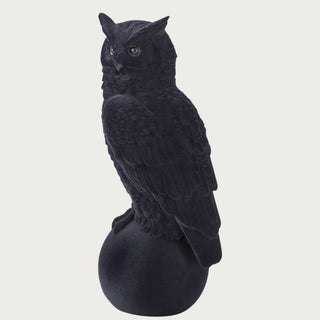 18.25-inch black velvet-flocked owl sculpture shown from the side with detailed feathering, perched feet, and a rounded pedestal base.