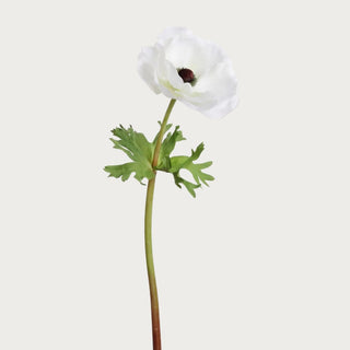 18-inch Real Touch White Anemone stem styled in a winter floral arrangement with greenery and neutral home décor.