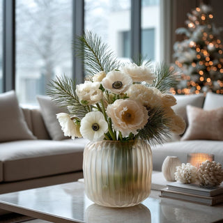 18-inch Real Touch White Anemone stem styled in a winter floral arrangement with greenery and neutral home décor.