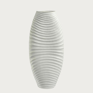 19.5" tall sculptural white vase with textured wave pattern and made of ceramic.