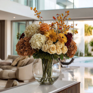 20.5" antique brown faux dried hydrangea stem styled in a vase with other fall inspired florals