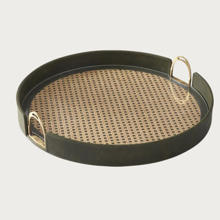 20-inch round tray with deep olive green leather, natural woven rattan inlay beneath clear acrylic, and curved gold-tone metal handles.