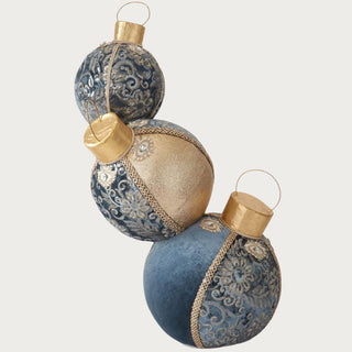 24-inch three-stacked blue and gold velvet ornament sculpture with jeweled embroidery and metallic trim displayed in elegant blue room – luxurious handcrafted holiday decoration for console or mantel styling.