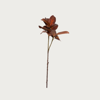 26-inch artificial bourbon brown magnolia leaf spray with realistic layered leaves in warm brown and russet tones.