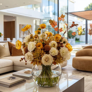 29" yellow real touch poppy stem styled with other fall florals on a coffee table of a modern contemporary decor style living room