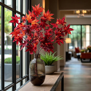 30" Deep Rust Colored Maple Leaf Stem Styled in a vase on a modern console table 