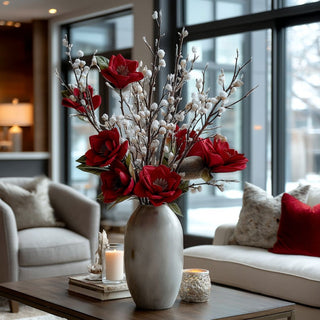 35" Tall Deep Red Velvet Magnolia Stem in Decorative vase with red flowers on a coffee table in a living room setting