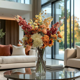 37 inch styled dark peach delphinium stem in a tall glass vase with other fall inspired florals