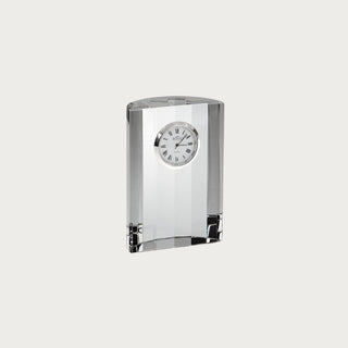 4.5-inch crystal table clock with clear beveled rectangular body, round silver-tone Roman numeral clock face, and polished reflective edges.
