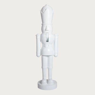 40-inch Glossy white resin nutcracker with modern silhouette, elegant holiday décor for fireplace, entryway, or Christmas display. Third & Main, Home Decor, 