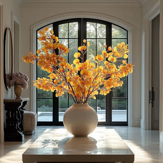 42" aspen stems Styled in a large creamy white vase on an elegant table of a beautiful entryway 