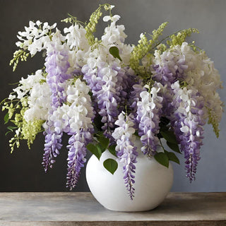 Close-up of lavender and white bloom clusters on the wisteria stem