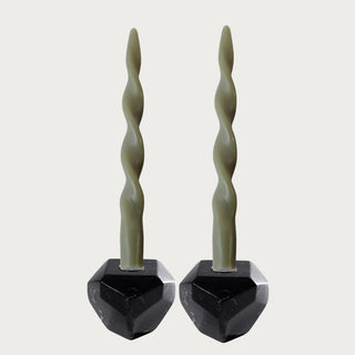 4 inch Trinity Black Marble Taper Candle Holder with faceted black marble base and olive taper candle shown for styling reference.