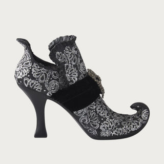 Side view of 6.75 inch black and silver resin witch boot with rhinestone buckle for glamorous Halloween decor