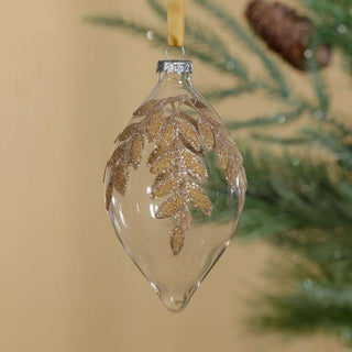 6-inch gold beaded leaf design glass ornament hanging on Christmas tree branch – handcrafted clear glass holiday ornament with gold leaf beading for elegant Christmas décor.