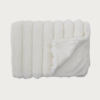 60" White Faux Fur Throw blanket is the epitome of luxury blankets. So soft and and fitting for contemporary, luxe and modern farmhouse home decor styles.