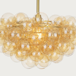 Modern amber bubble glass chandelier with sculptural design and brass accents, luxury lighting centerpiece for home décor. Home Decor, Third & Main, Regina Andrews Lighting, Luxury Lighting, Contemporary Lighting, Fall Decor
