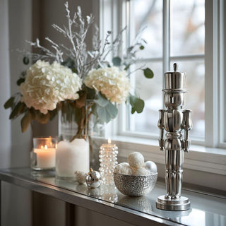 9-inch metallic silver resin nutcracker — modern sculptural holiday décor figurine in quiet luxury winter style by Third & Main.