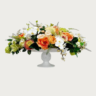 Large premade faux floral arrangement with peach and white spring blooms in a white pedestal vessel, measuring 35x35x20, designed for elevated dining tables, kitchen islands, and statement home styling.