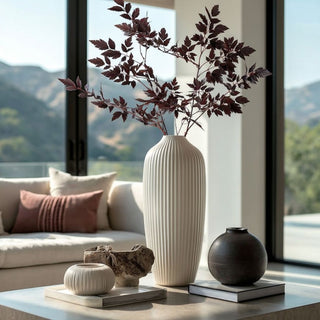 Artificial burgundy cimicifuga stems in tall ivory vase – realistic 31-inch faux branches for seasonal home décor and modern entryway arrangements.