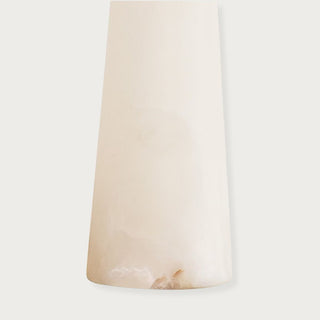 Modern alabaster table lamp with tapered conical base, brass hardware, and rectangular pull chains topped with a white lampshade. Home Decor, Third & Main, alabaster table lamp, modern table lamp, alabaster stone lighting, brass table lamp, bedside lighting, contemporary lamp, Luxury decor