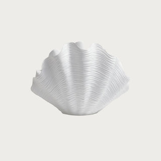 white sculptural shell vase with organic ridged texture for coastal luxury bookshelf and console table styling