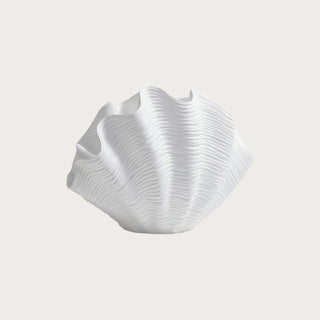 white sculptural shell vase with organic ridged texture for coastal luxury bookshelf and console table styling