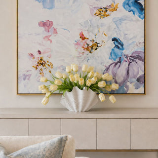 Belize Shell Vase styled with white tulips beneath Ethereal Wall Art on luxury coastal console table with ocean view and soft natural light