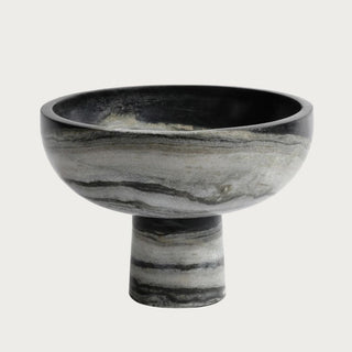 9.75-inch black and white marble pedestal bowl with natural gray and charcoal swirled veining and a round pedestal base.
