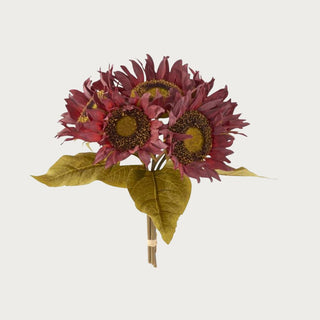 Bouquet of 6 stems of artificial burgundy colored sunflowers with green leaves on a light gray background