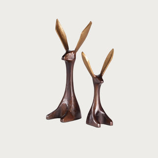 A set of two bronze colored aluminum  jackrabbits with gold ears. contemporary decor, luxury decor, spring decor, modern traditional, bunny, rabbit, decor, Third & Main