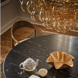 Contemporary chandelier featuring round amber glass bubbles clustered on a brass frame, elegant ceiling light fixture for modern interiors. Home Decor, Third & Main, Regina Andrews Lighting, Luxury Lighting, Contemporary Lighting, Fall Decor