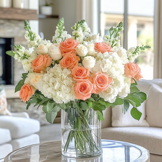 A beautiful floral arrangement with the coral true bloom floral real touch duchess rose stem, white real touch hydrangea, white roses and mixed greenery, 25" Coral True Bloom Floral  Real Touch Duchess Rose, Real Touch, Rose, Duchess Rose,  Faux Floral, Third & Main, Home Decor Spring Decor, Everyday Decor, Roses
