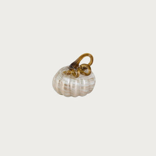 3.25 Inch Cream & Gold Swirl Glass Pumpkin with a rounded cream glass body, soft marbled swirl finish, and gold-toned sculptural glass stem for neutral fall decor.