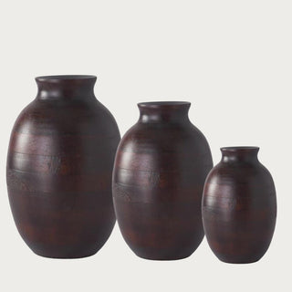 Small, medium, and large dark brown mango wood vases shown together with rounded silhouettes, narrow necks, and natural tonal variation.