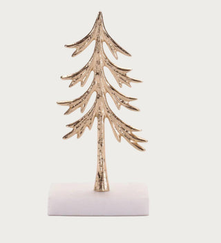 Decorative gold tree sculpture on a white  marble base