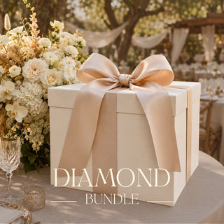 Large Gift Box sitting on a luxurious set table, with cream linens, fresh florals and a beautiful sunlit scene of california in the background.