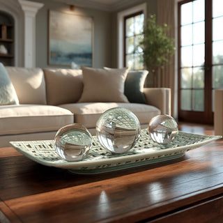 Rectangular woven ceramic tray with open lattice design and soft neutral glaze, styled as an elegant decorative accent