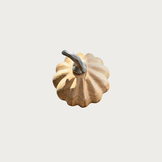 Gently used 4-inch mango wood pumpkin with a resin stem – natural carved wood decorative accent for shelves or trays.