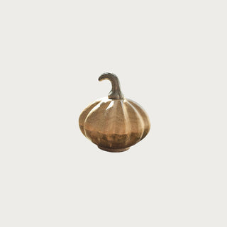 Gently used 4-inch mango wood pumpkin with resin stem – natural carved wood decorative accent for shelves or trays.