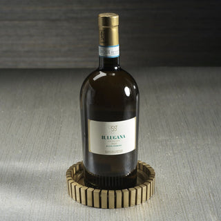 Gold metal wine bottle coaster with sculptural modern design — brushed aluminum tabletop accessory for bar or holiday entertaining by Third & Main.